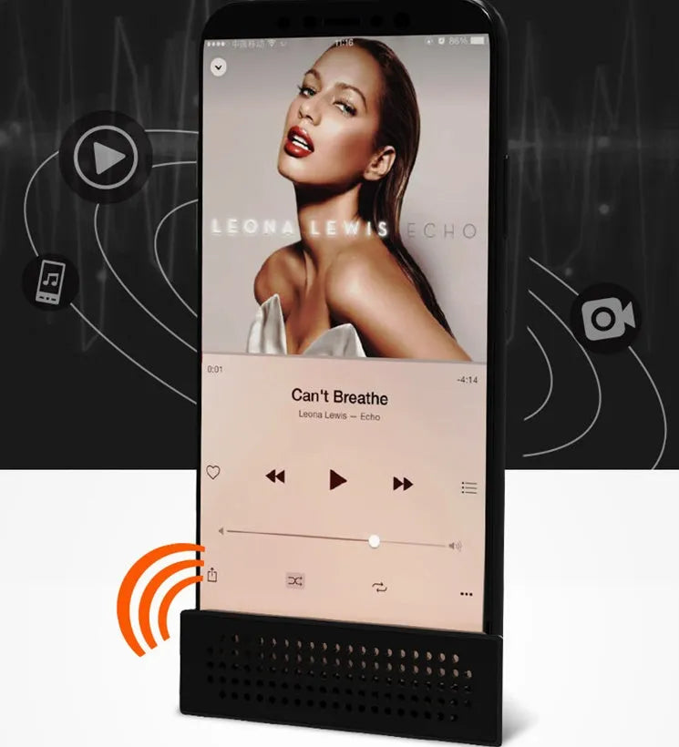 Portable black ABS mobile phone amplifier bracket holding an iPhone on a desk