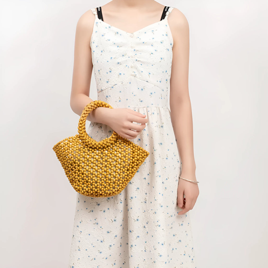 Maple wood hand-woven seaside handbag with wooden beads in dumpling shape