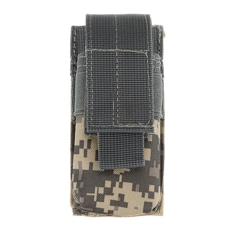 Black MOLLE-compatible tactical waist pouch with elastic cord closure, shown next to a pistol magazine.