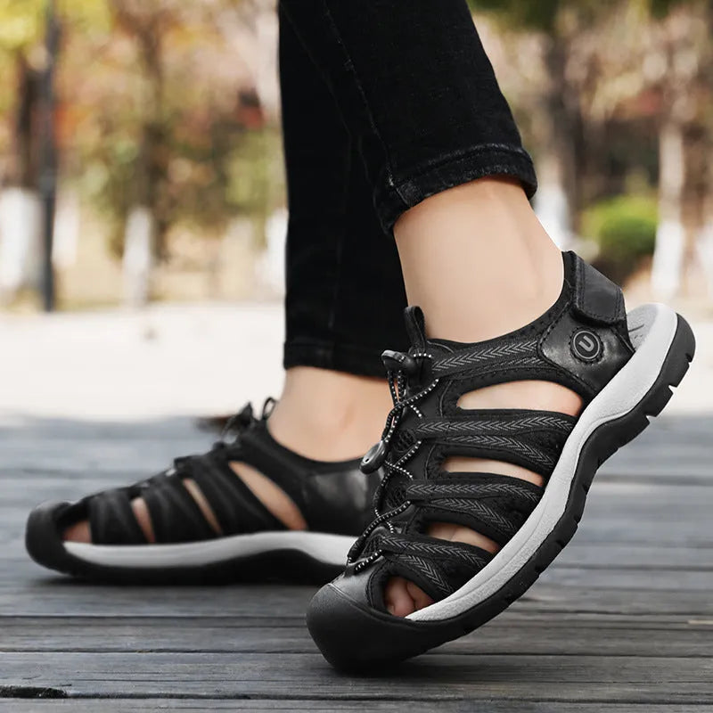 Women's black leather mesh toe box sandals with elastic band fastening