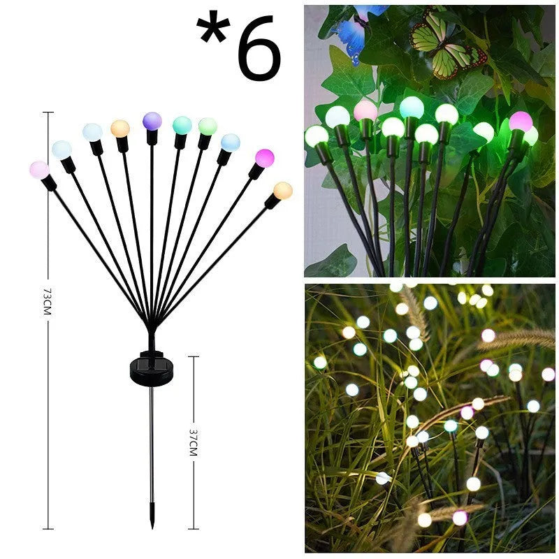 Solar-powered LED garden light with multiple heads on stainless steel ground spikes