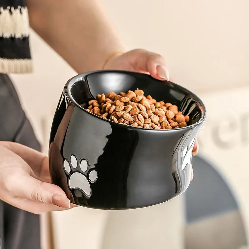 Ceramic cat bowl with high-footed design showing cat's paw decoration pattern in selected colour