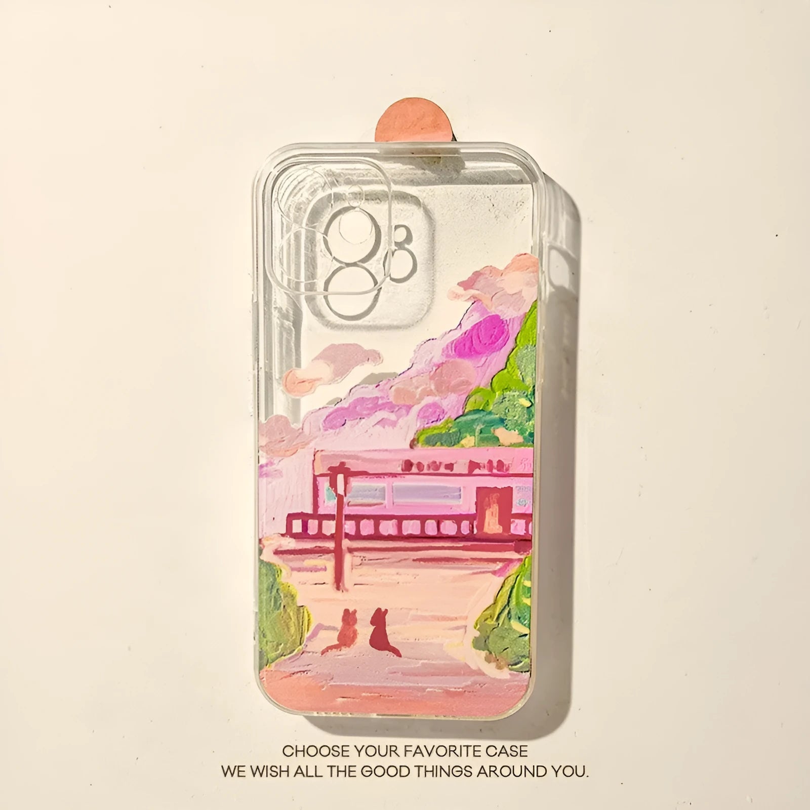 Soft silicone iPhone case with a cartoon design of two cats on the back.