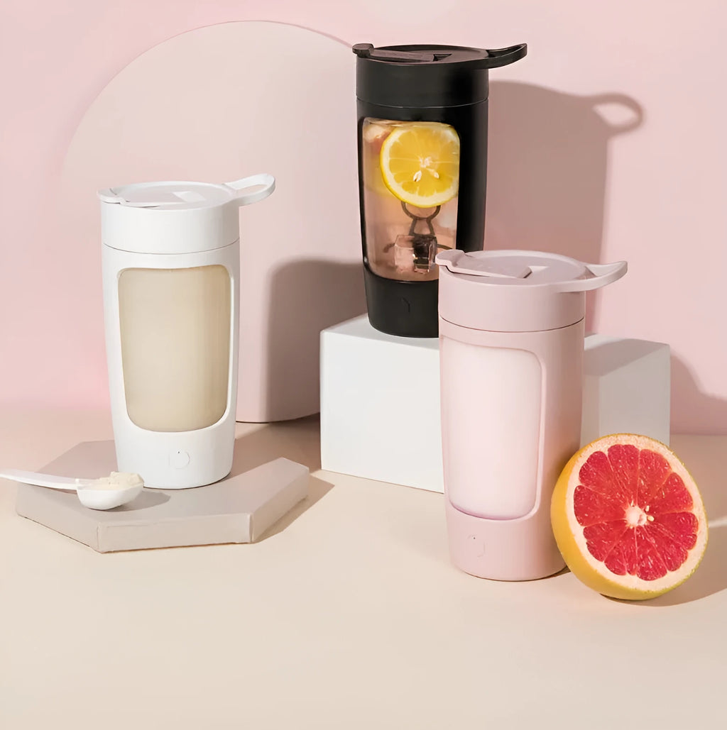 Portable automatic blending cup with lid, shown in available colours with 650ml capacity marking