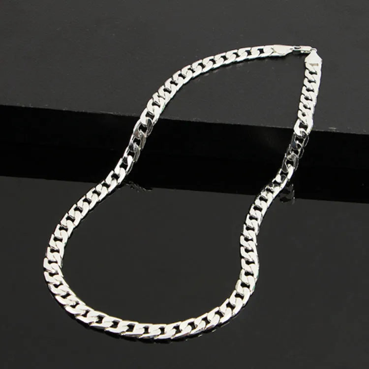Men's flat side NK necklace large chain 60cm golden finish on display