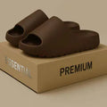 Women's thick sole beach slippers in beige, black, brown, and green colours showing EVA construction and youth fashion style
