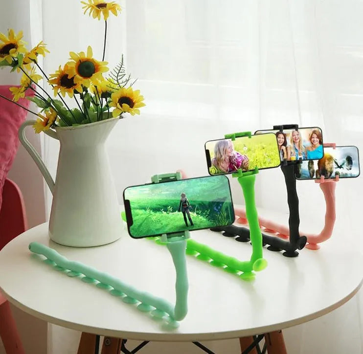 Flexible worm-style mobile phone holder with suction cup base showing 62cm reach and 360-degree rotation