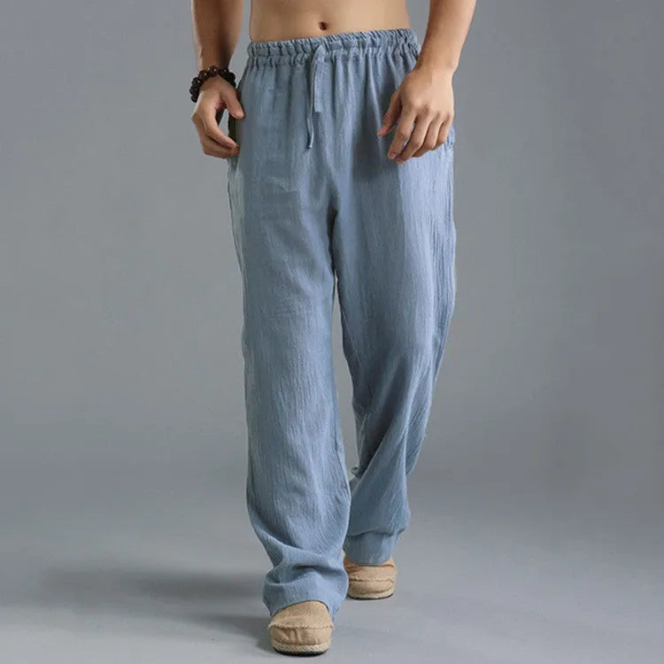 Men's linen loose casual sports pants in khaki, side view, on a hanger