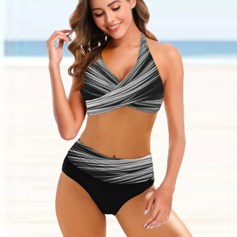 Ladies striped tie-dye bikini set with hollow back and high-waisted briefs on a mannequin.