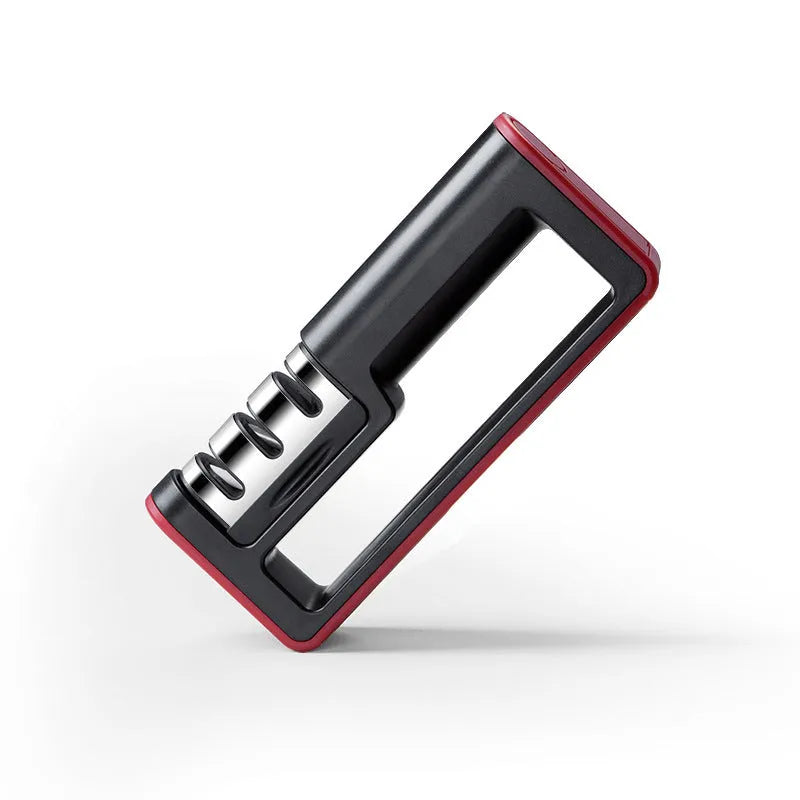 Black and red professional three-stage knife sharpener with non-skid rubber feet.