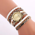 Ladies wrap watch with leopard weave bracelet and round alloy case on white background