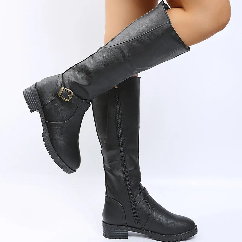 Women's black knight-style high boots with a round toe, buckle detail, and a square heel.