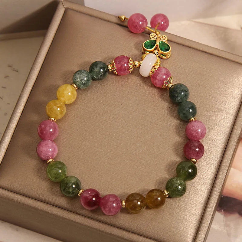Tourmaline butterfly pendant bracelet with natural jade colour accents and rhinestone details on adjustable alloy chain