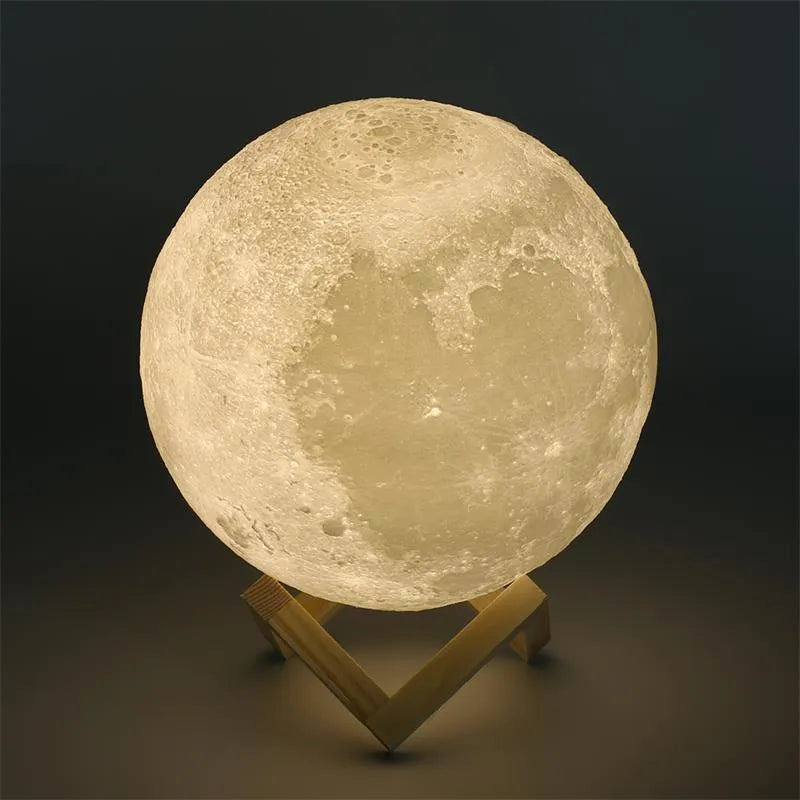 3D printed white moon lamp with textured surface on a wooden stand, showing touch ring at base