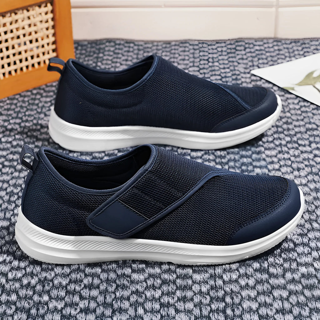 Summer walking shoes with mesh upper, flat heel, and Velcro fastening in black, grey, blue, or wine red.