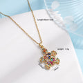 Gold-plated copper sea turtle necklace with zirconium accents and mixed gemstone inlay, O-link chain, light luxury style for women