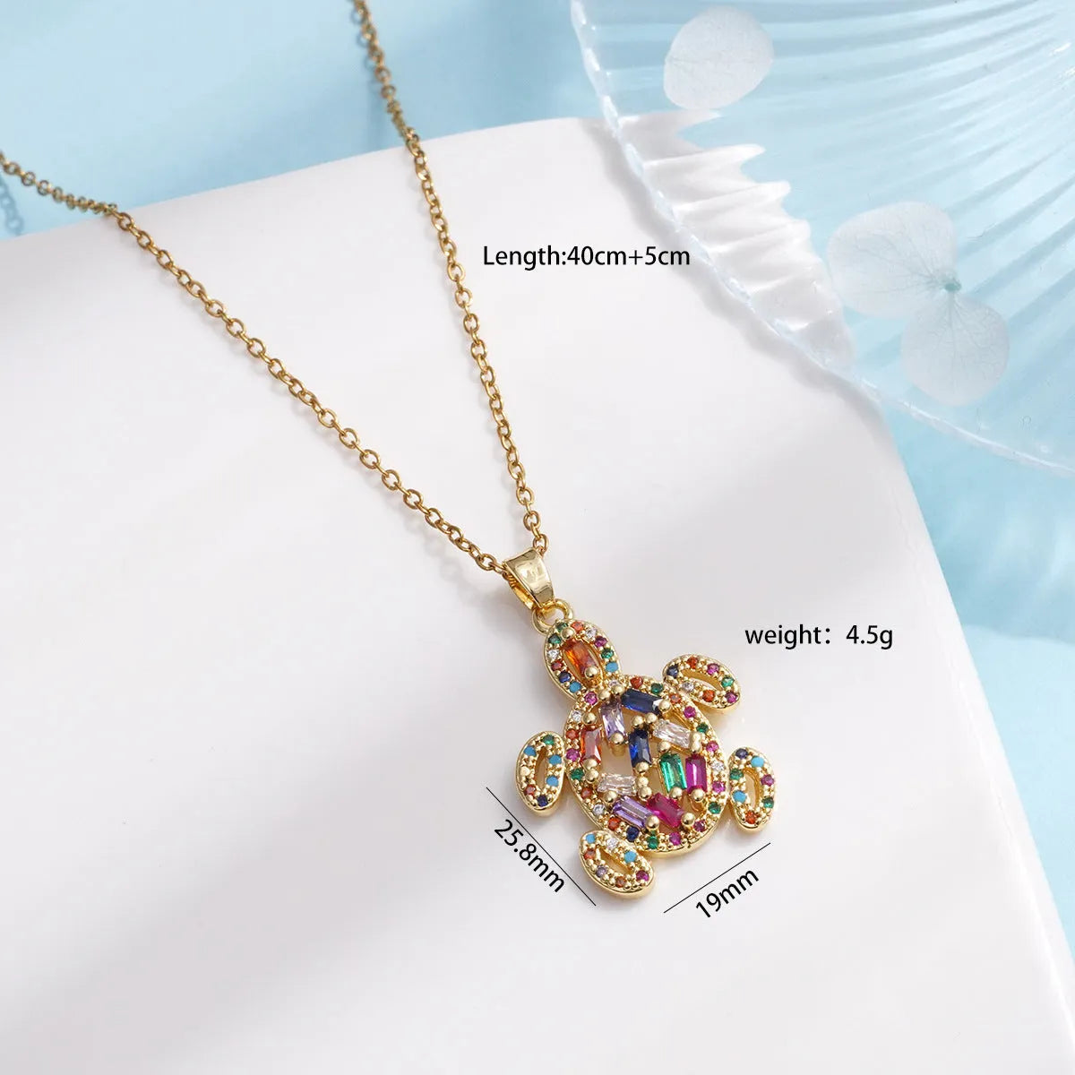 Gold-plated copper sea turtle necklace with zirconium accents and mixed gemstone inlay, O-link chain, light luxury style for women
