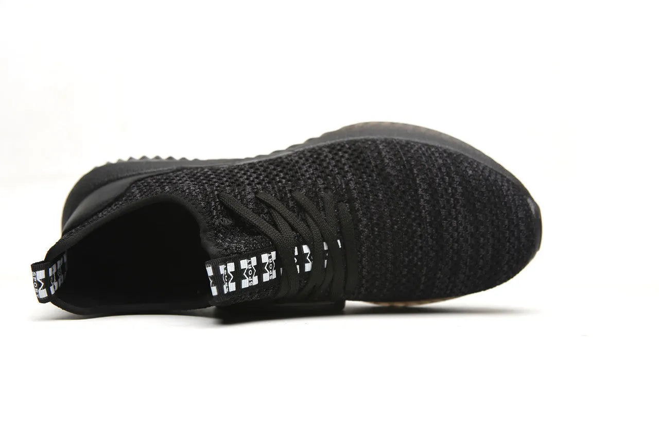Black anti-static steel toe cap safety shoes with a low-cut EVA construction.
