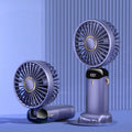 Mini portable handheld electric fan in blue with foldable design and LED battery display