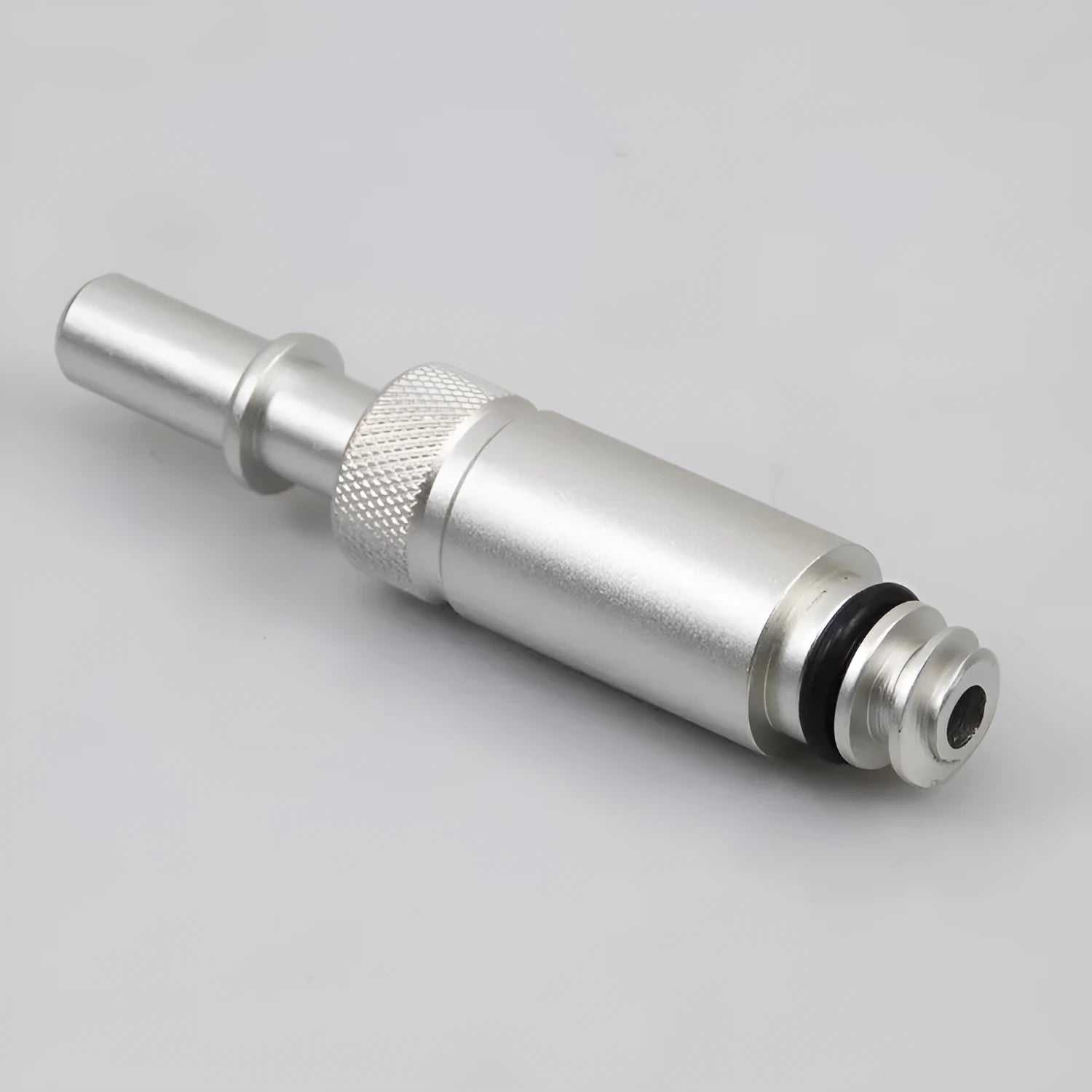 Silver metal transmission refueling joint adapter for VAS6262-9 procedure on white background.