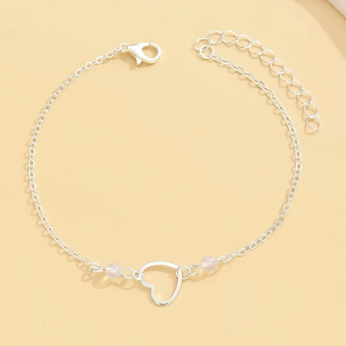 Women's adjustable alloy anklet with heart-shaped pendant in gold or silver colour
