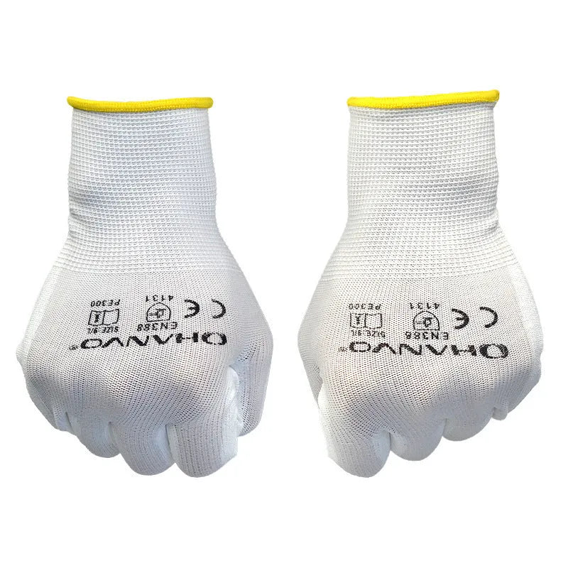 White PU-coated labour gloves showing flexible design and 24cm length on work surface