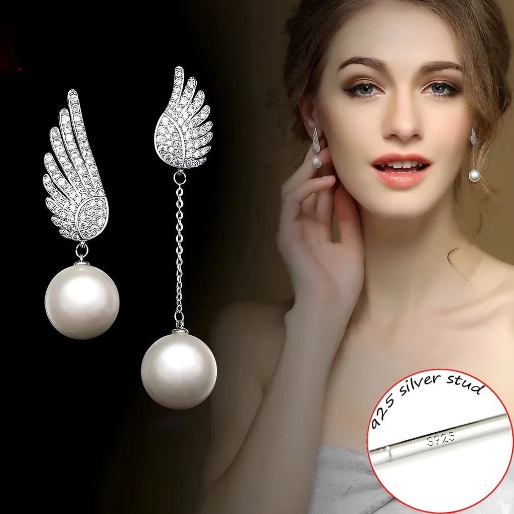 Silver angel wing earrings with diamond treatment and gold-plated gemstone inlay in platinum colour