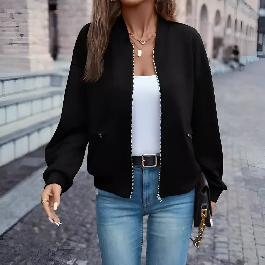 Black women's zip jacket with faux pockets and long sleeves showing front view