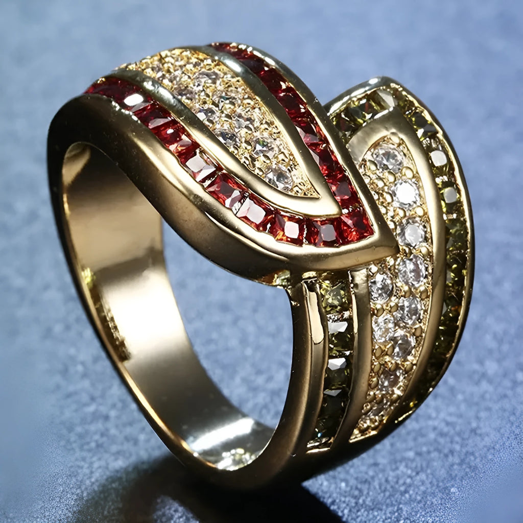 Gold tone alloy women's ring with a central peridot green stone.