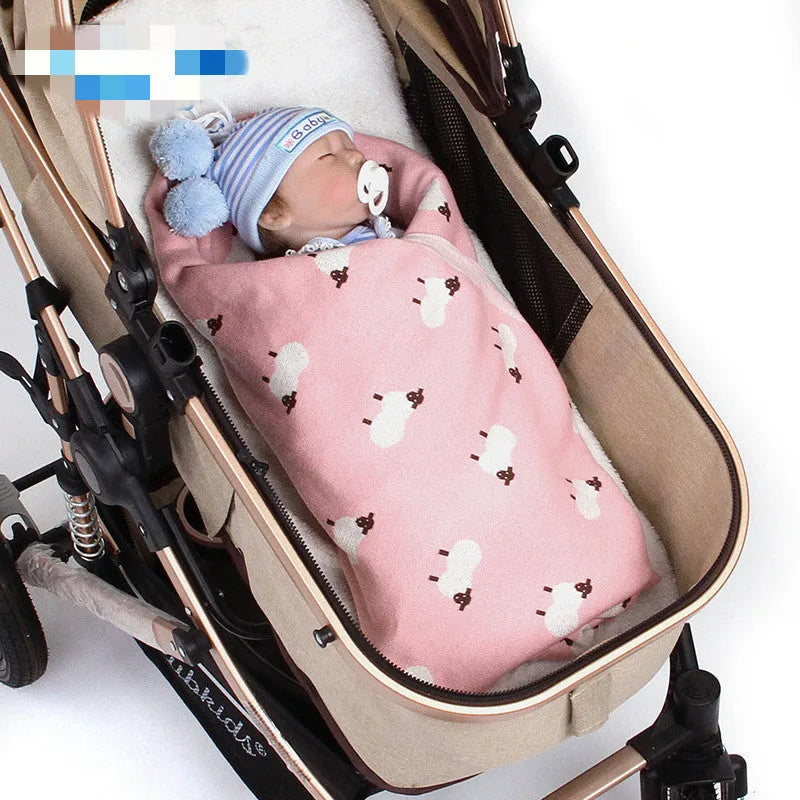 100x80cm grey and pink baby sheepskin blanket made from 100% cotton fabric laid flat.