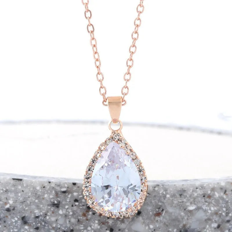 Rose gold geometric water drop pendant necklace with rhinestone inlay