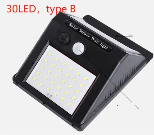 White outdoor solar garden lamp with integrated solar panel on top and LED light array.