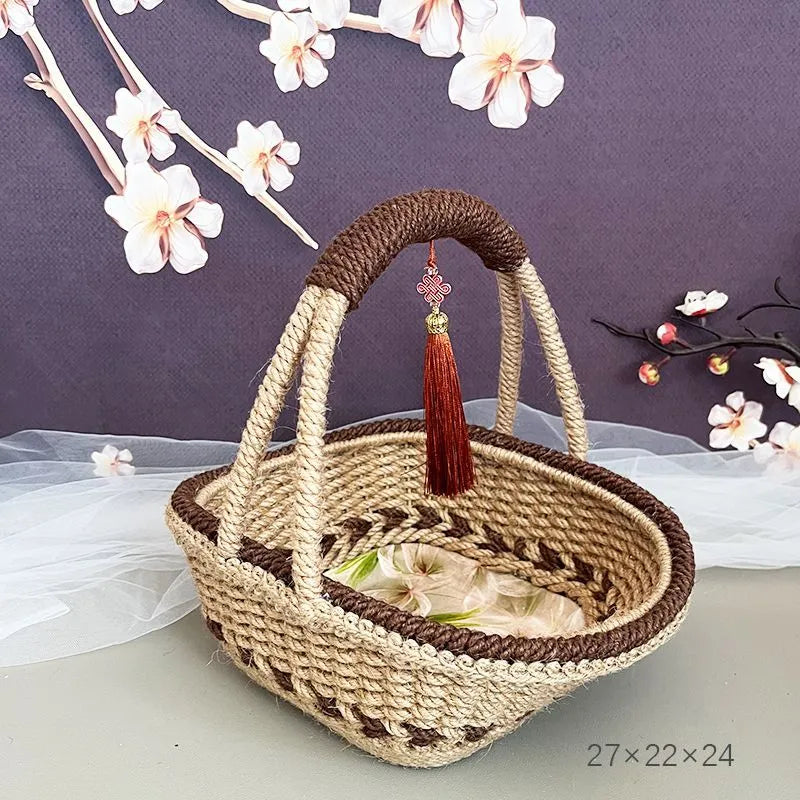 Coffee brown hand-woven straw basket with hemp rope accents measuring 19cm by 12cm