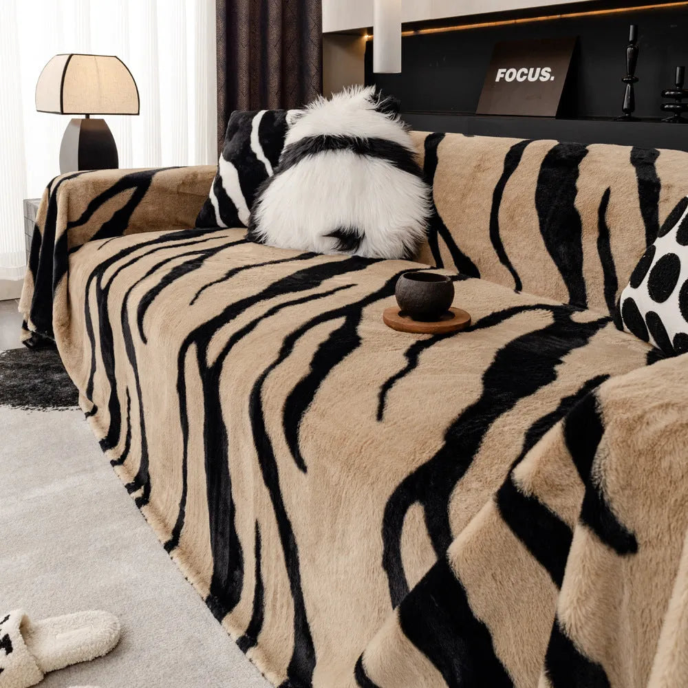 Zebra pattern flannel sofa cover with matching pillowcase in a light luxury style.
