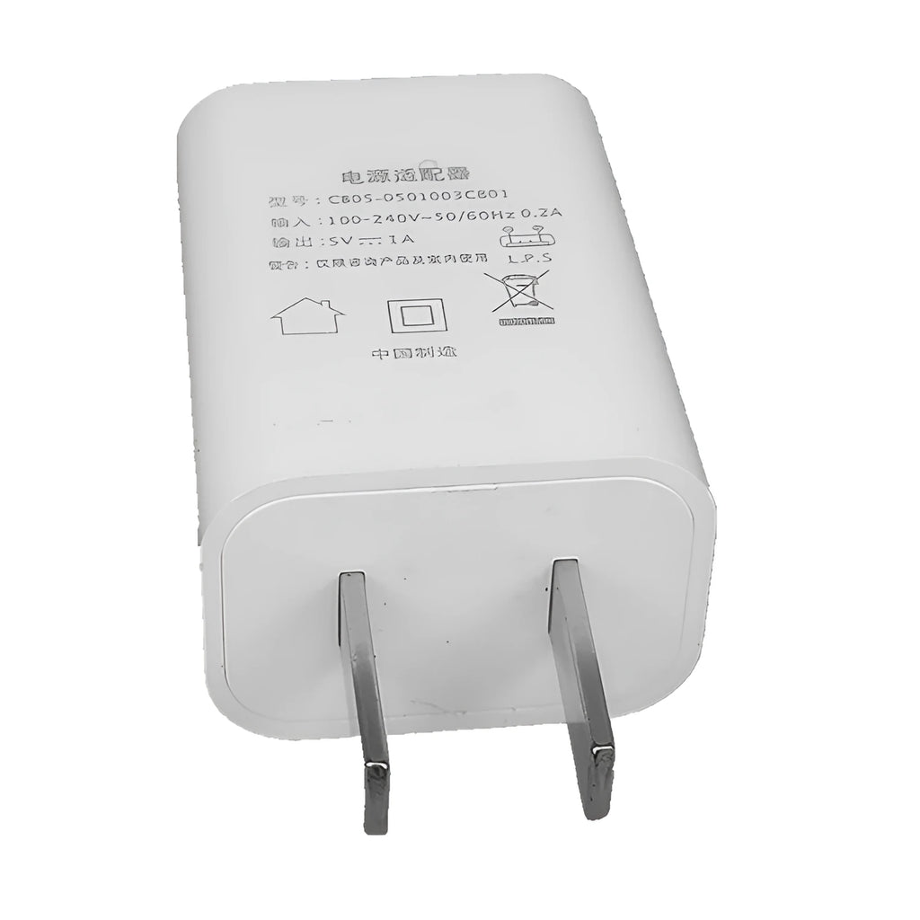 Slim white 5V 1A USB wall charger with CE and FCC marks on a white background.
