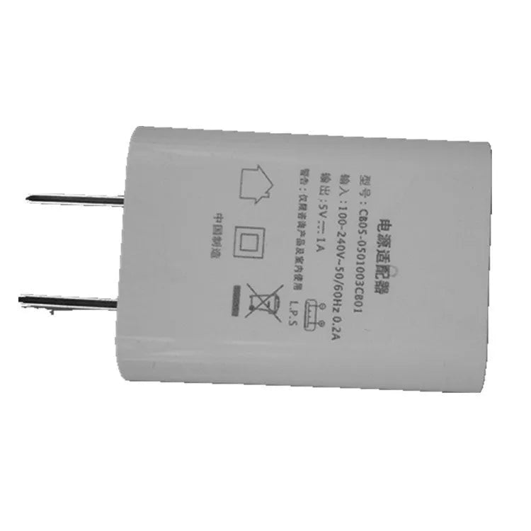 Slim white 5V 1A USB wall charger with CE and FCC marks on a white background.