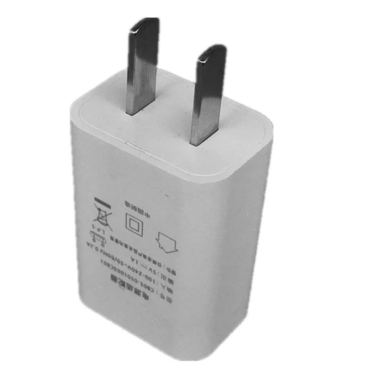 Slim white 5V 1A USB wall charger with CE and FCC marks on a white background.