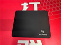 Black thickened rubber gaming mouse pad with rough grain textured surface measuring 270mm by 220mm