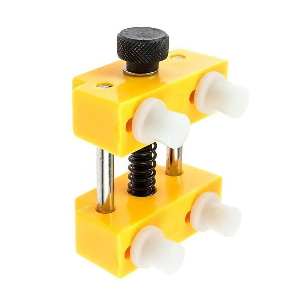 Yellow plastic watch repair kit with adjustable opener tool and fixing base