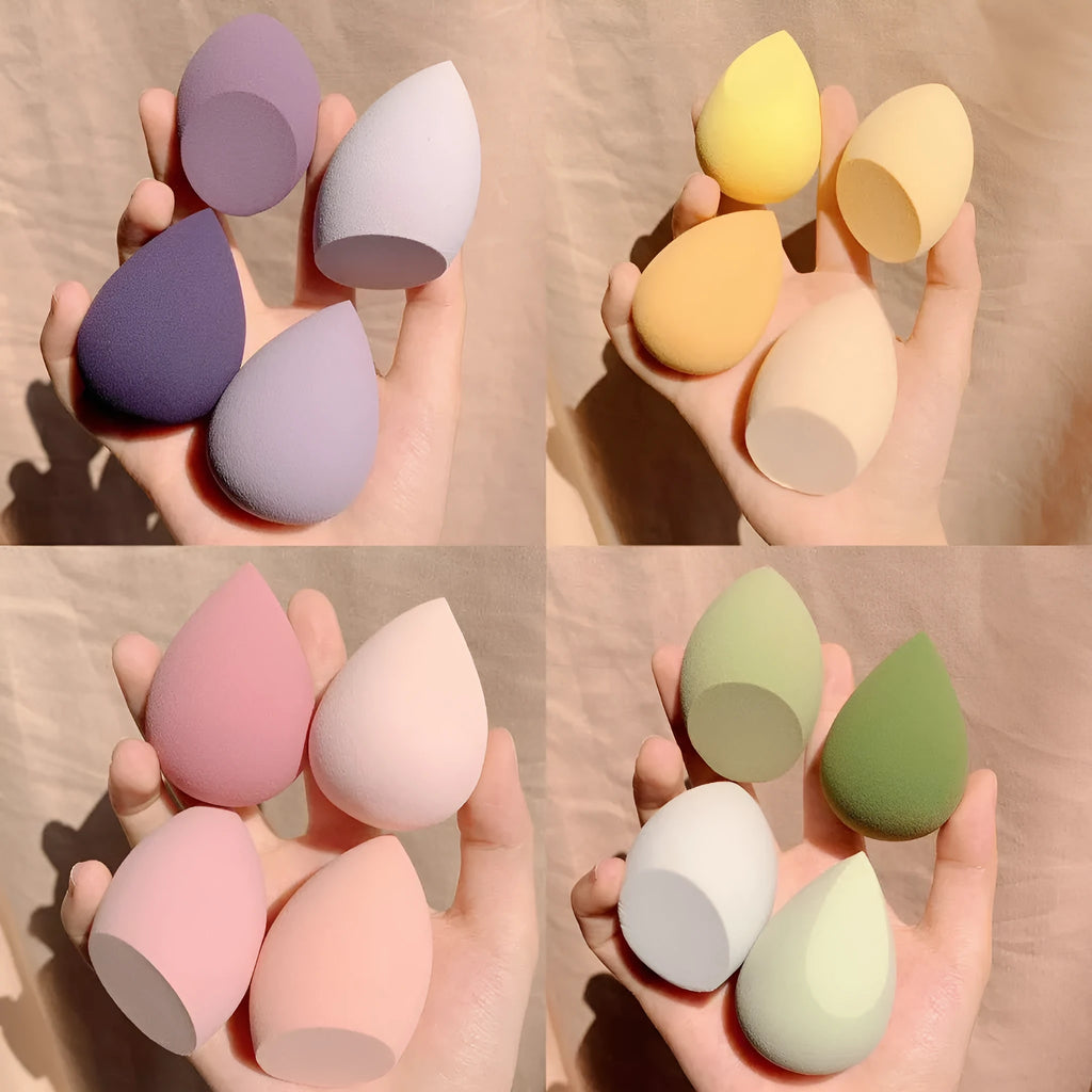 Box containing four coloured makeup sponge eggs in grape, mango, mint, and peach, each roughly 6cm in size.