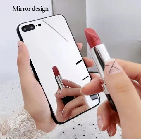 Black iPhone phone case with a built-in circular mirror on the back, shown next to an iPhone.