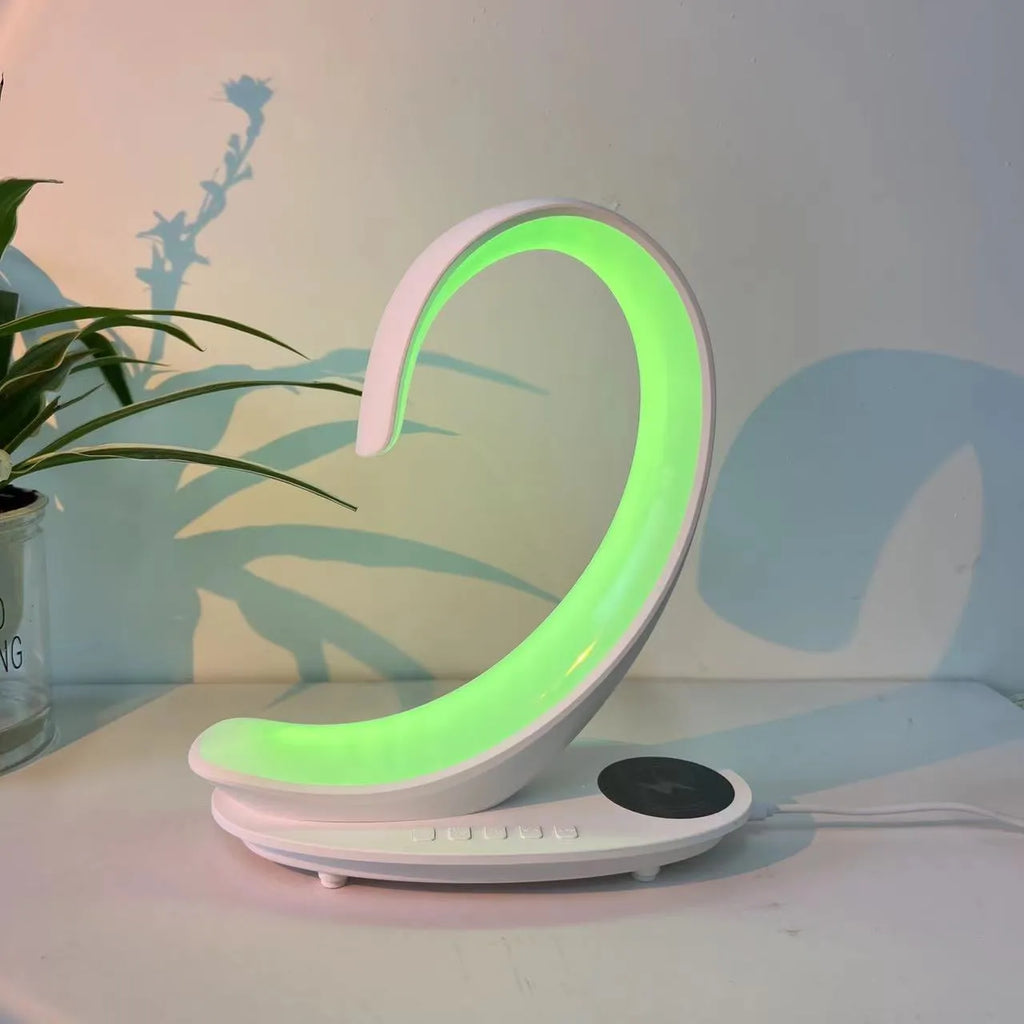 White Swan animal sculpture desktop wireless charger with Bluetooth speaker and colourful LED mood lighting