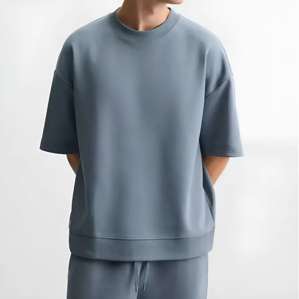 Loose-fitting polyester co-ord set with short sleeve T-shirt and matching shorts in four colour options