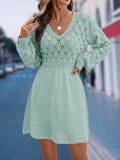 Artistic retro V-neck long sleeve dress in apricot with a high waist and 3D pattern.