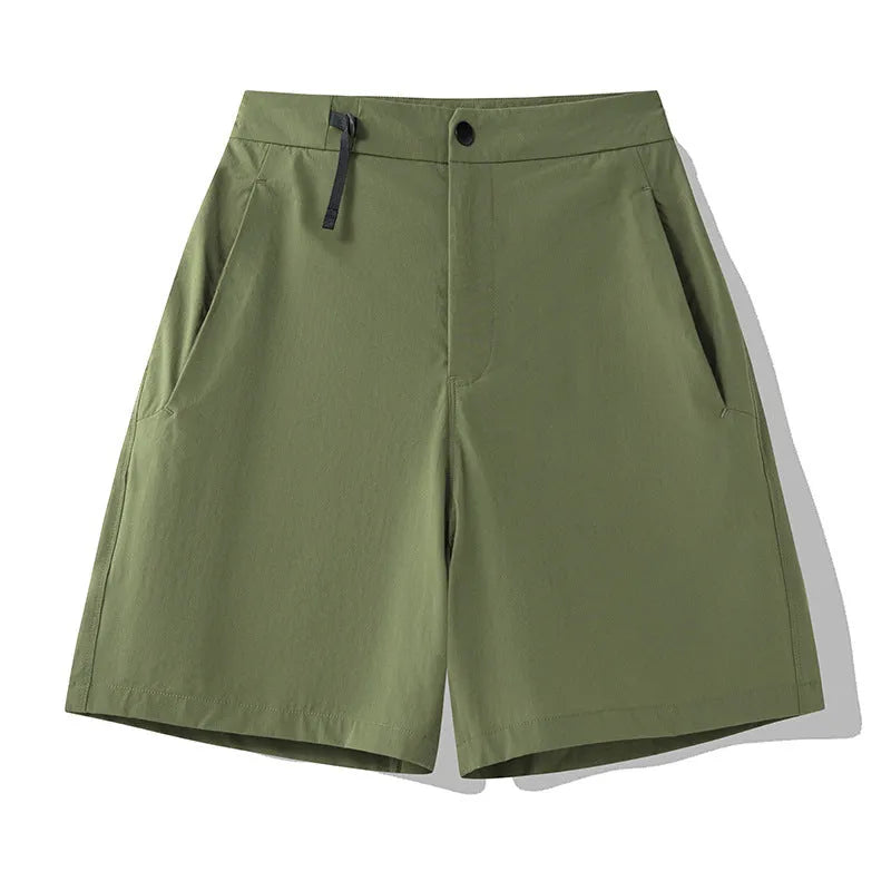 Men's quick-drying sports shorts in khaki colour with a four-sided elastic waistband, shown flat.