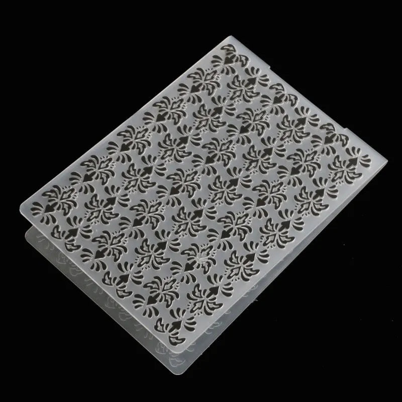 Plastic folding cake decorating mould showing windmill and five-pointed star design options