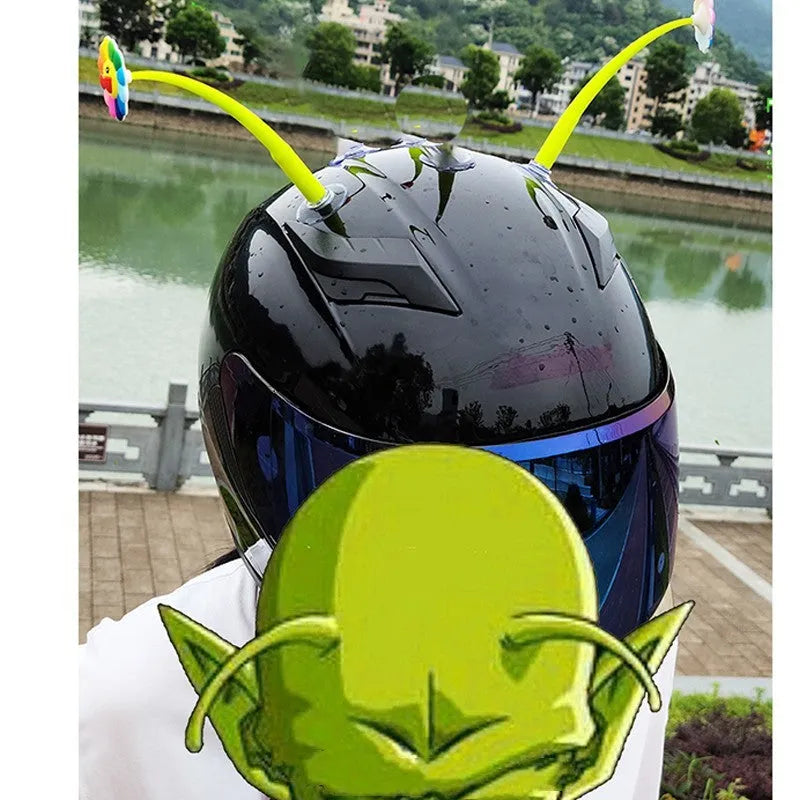 Yellow sunflower silicone decoration with a suction cup base for attaching to a helmet.