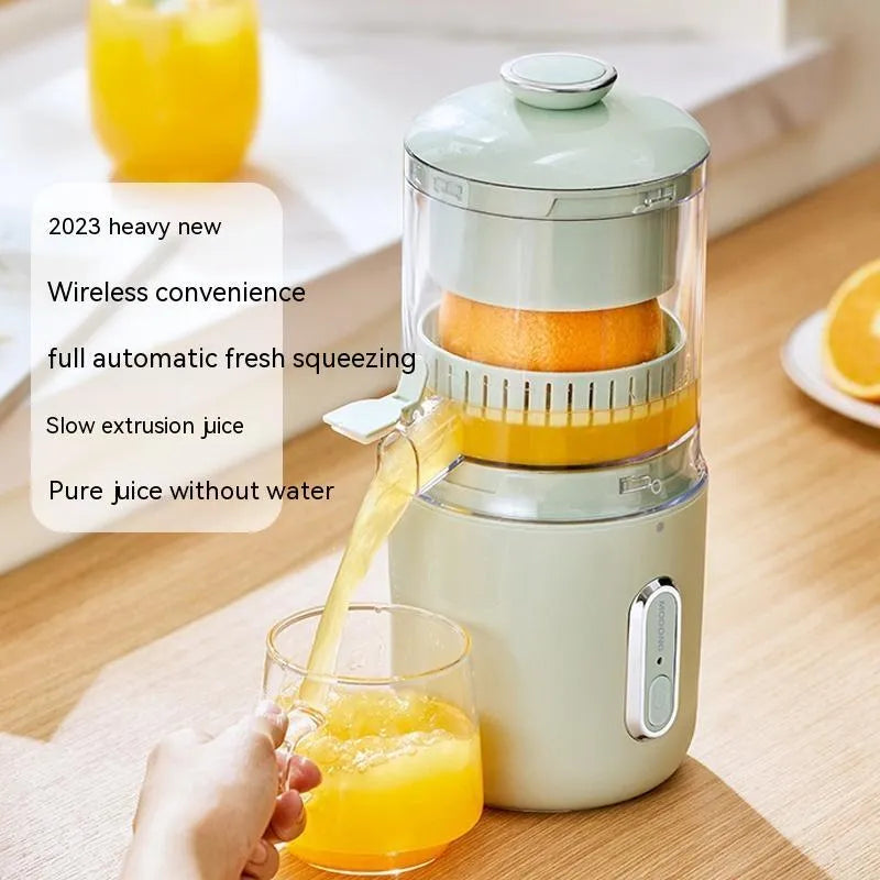Fresh green portable USB electric juicer for oranges and lemons on a kitchen counter
