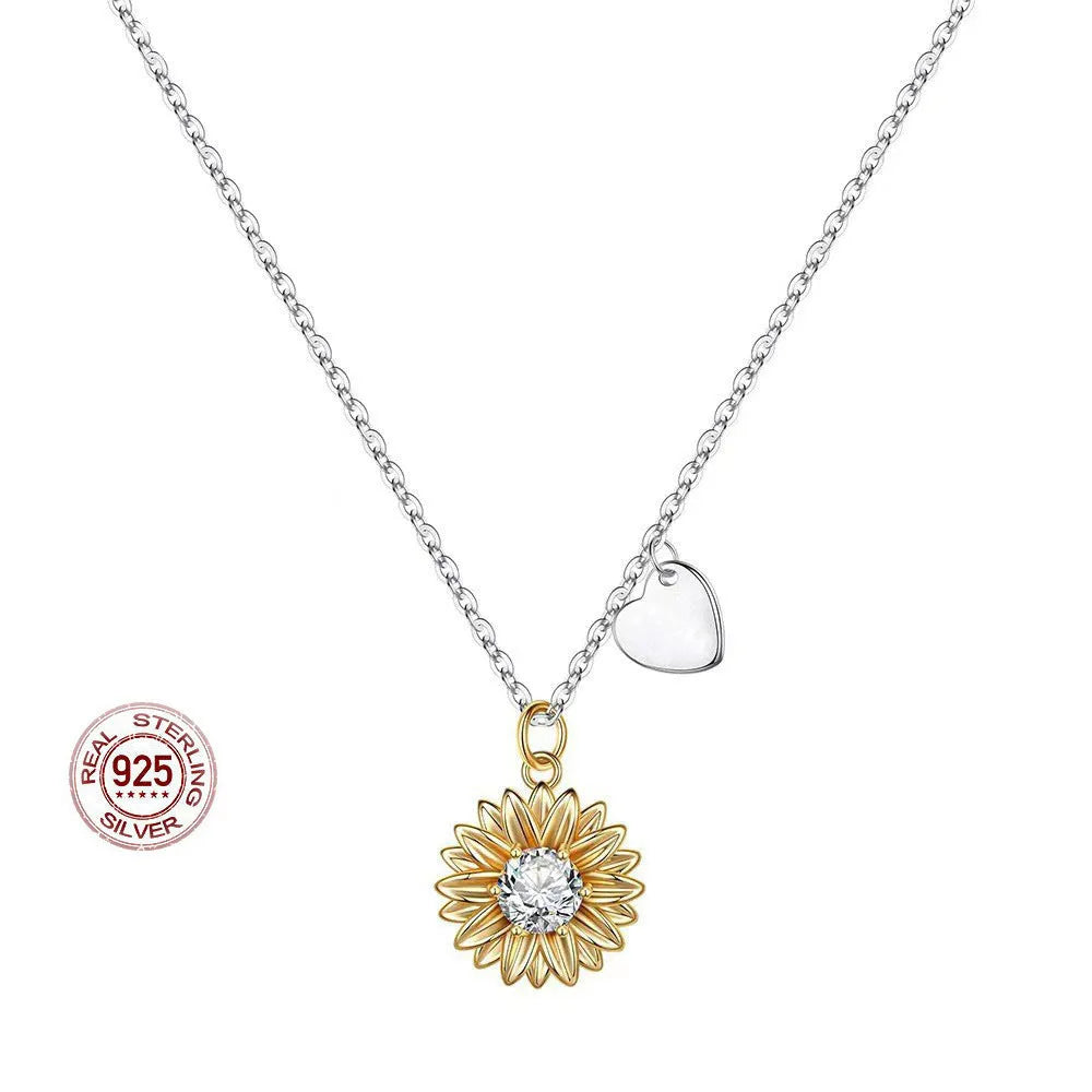 925 sterling silver sunflower pendant necklace on a cross chain, adjustable from 21cm to 50cm.