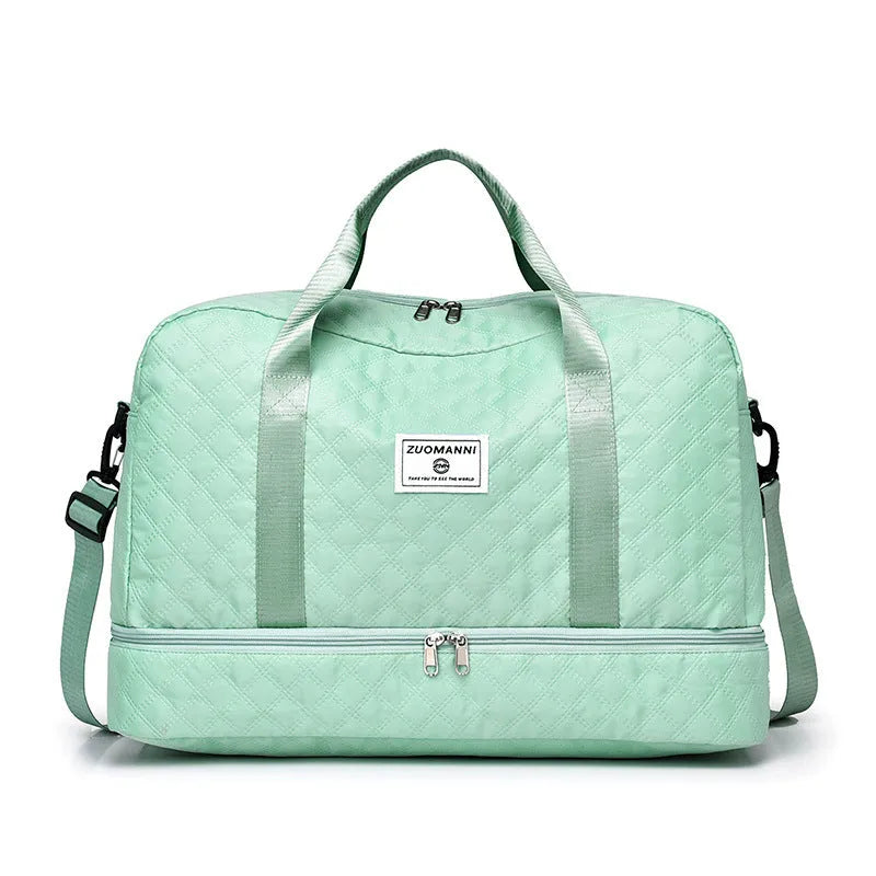Large Oxford cloth travel holdall in a solid colour, shown with a capacity of 36-55 litres for buggies and luggage.